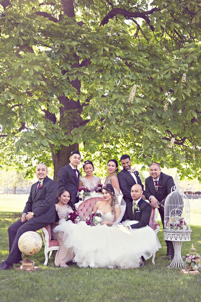 Elegant vintage-inspired purple and gold wedding - Wedding party portraits with vintage couch