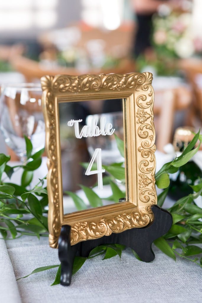 Vintage gold mirror table number frames - Romantic Rustic Wedding at the Steam Whistle Brewery