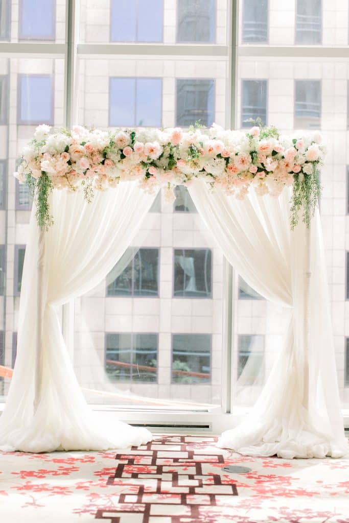 Blush and gold Shangri-La Hotel Toronto Wedding ceremony with roses and peonies