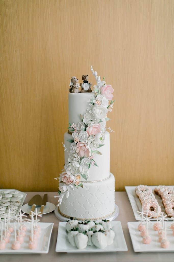 Blush and white sweets table and wedding cake