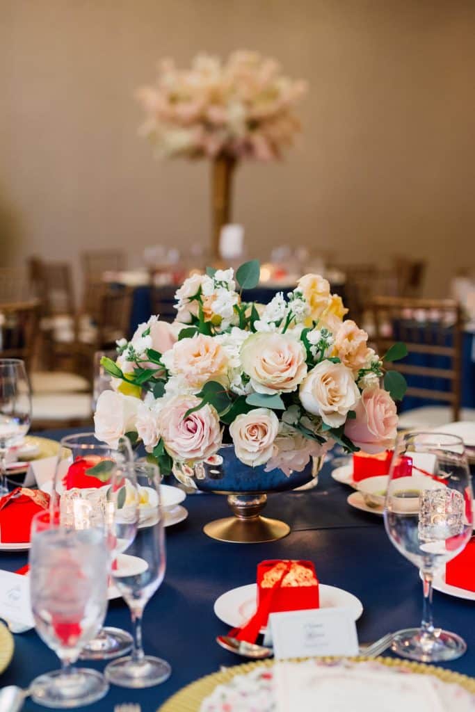 Shangri-La Wedding Reception with blush and yellow floral centerpiece