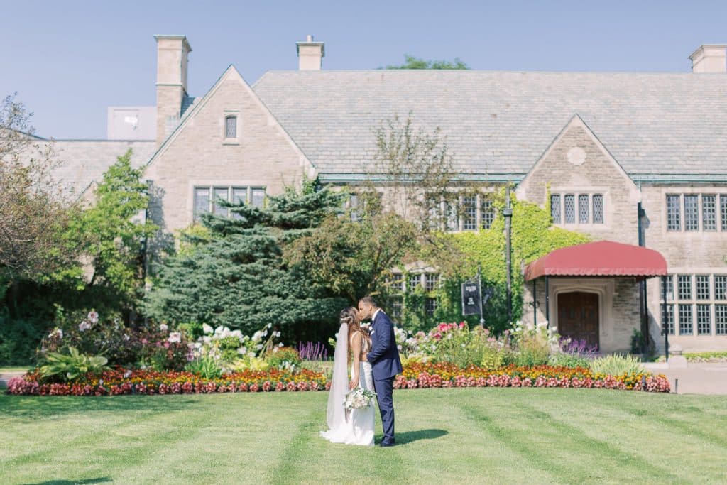 Blush and coral wedding ceremony at Estates of Sunnybrook