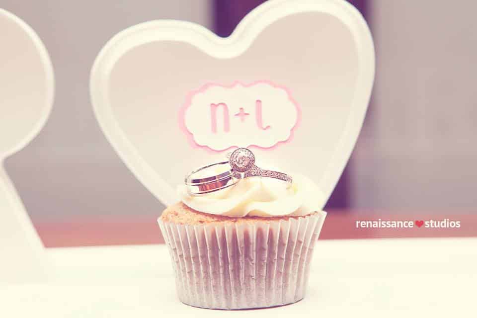 Wedding rings and cupcake, a delightful photo! www.rebeccachan.ca