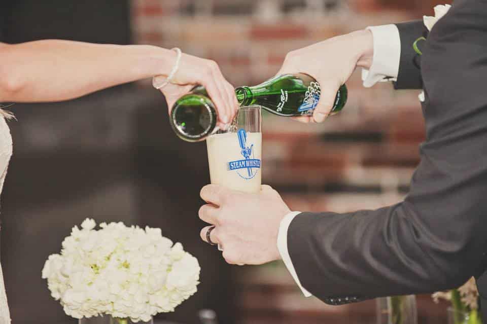 Wedding unit ceremony, pouring of Steam Whistle beer at the Steam Whistle Brewery, Toronto. See more at Rebecca Chan Weddings and Events https://www.rebeccachan.ca