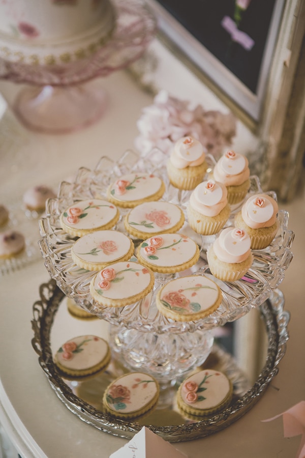 Vintage flower cookies on mirror tray. Coral and Gold Wedding Inspiration - See more at Rebecca Chan Weddings and Events www.rebeccachan.ca