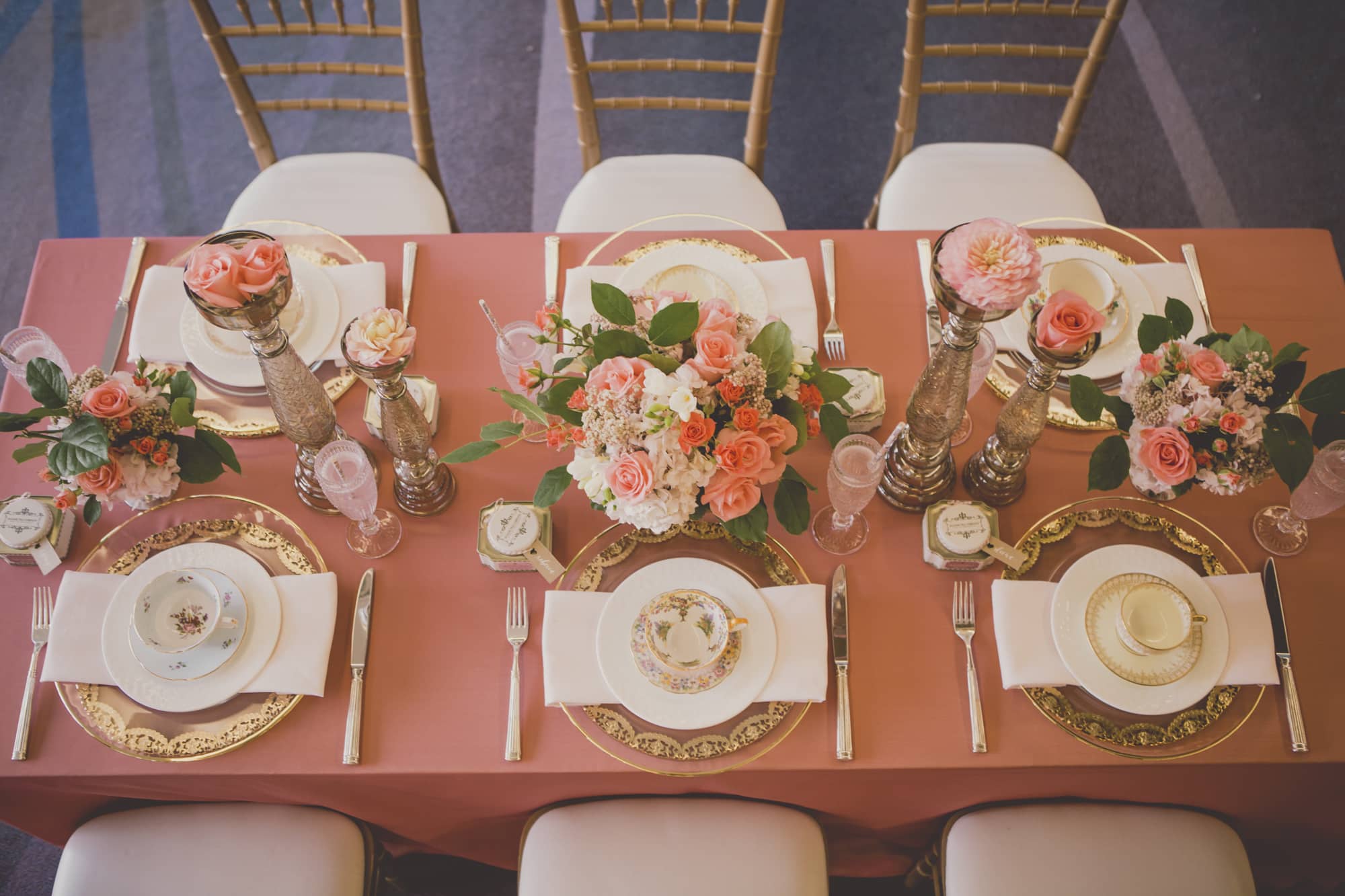 Coral and Gold Wedding tablescape - See more at Rebecca Chan Weddings and Events www.rebeccachan.ca