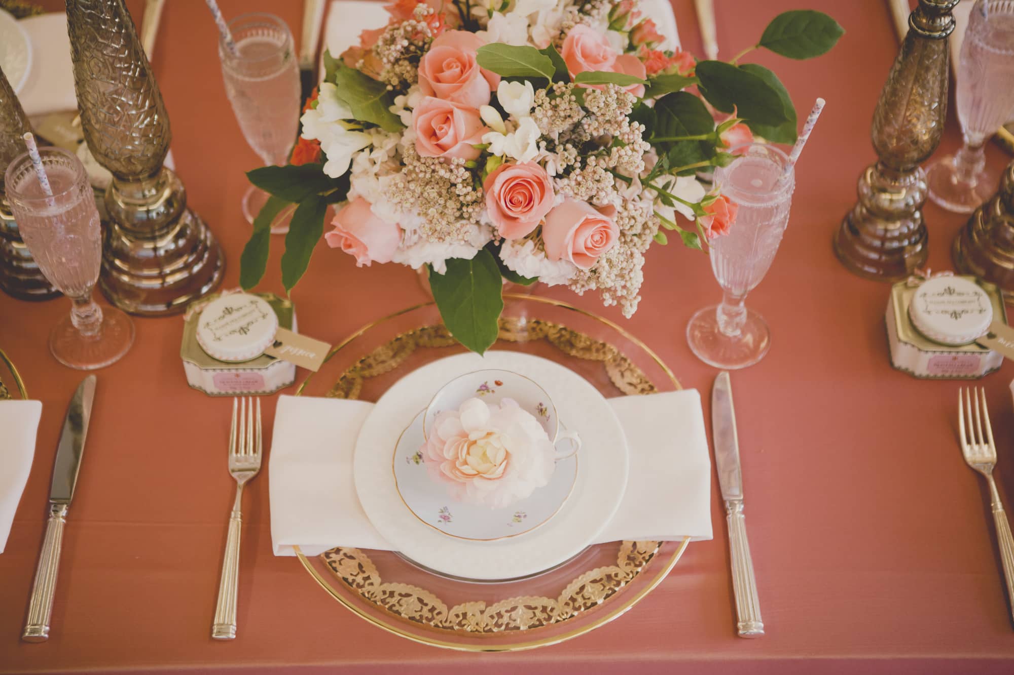 Coral and Gold Wedding place setting - See more at Rebecca Chan Weddings and Events www.rebeccachan.ca