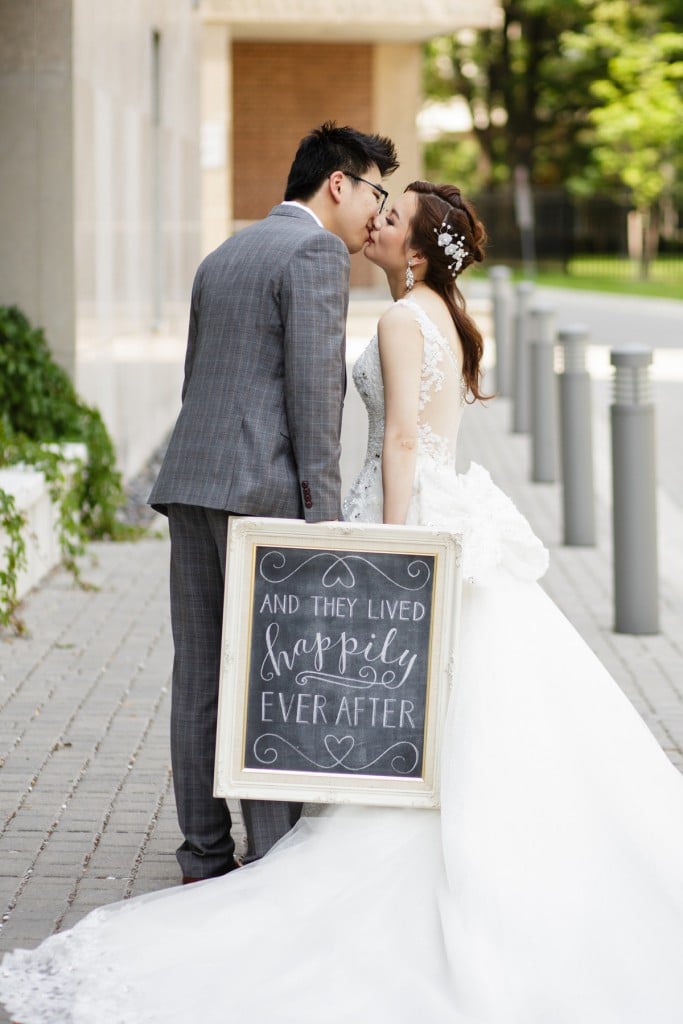 Bride and groom with happily ever after sign - Romantic blush pink wedding at Ritz-Carlton Hotel Toronto