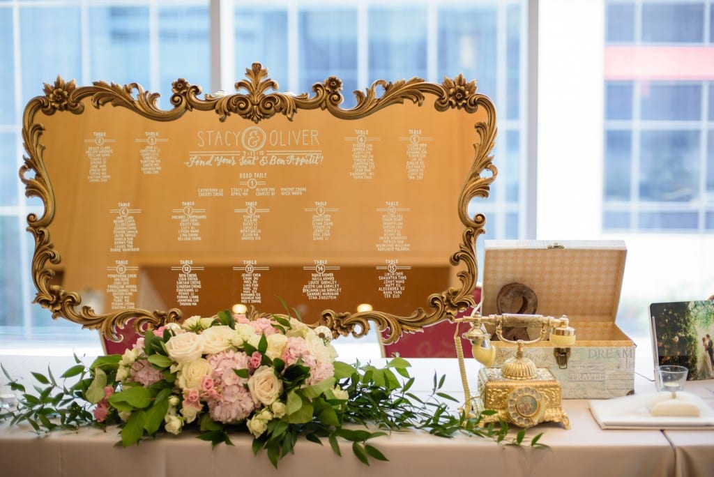 Vintage gold mirror seating chart - Romantic blush pink wedding at Ritz-Carlton Hotel Toronto
