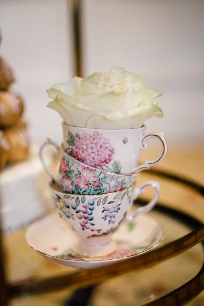 Estates of Sunnybrook indoor ceremony inspiration - vintage tea cups stacked