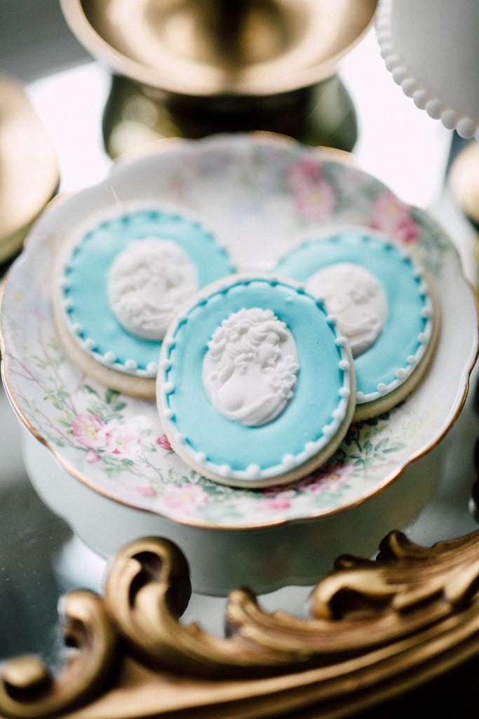 Estates of Sunnybrook indoor ceremony inspiration - vintage saucer with cookies