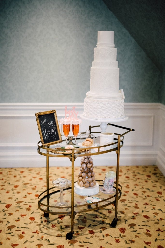 Estates of Sunnybrook indoor ceremony inspiration - gold bar cart sweets table