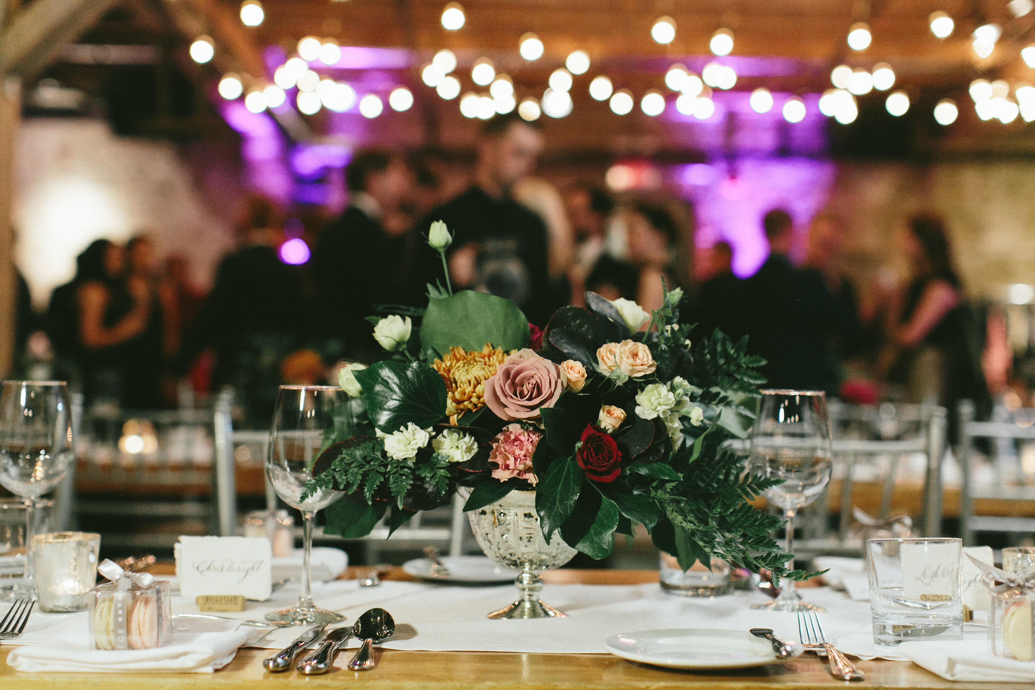 Elegant and Rustic Toronto Wedding in the Distillery District - Organic and loose floral centrepiece