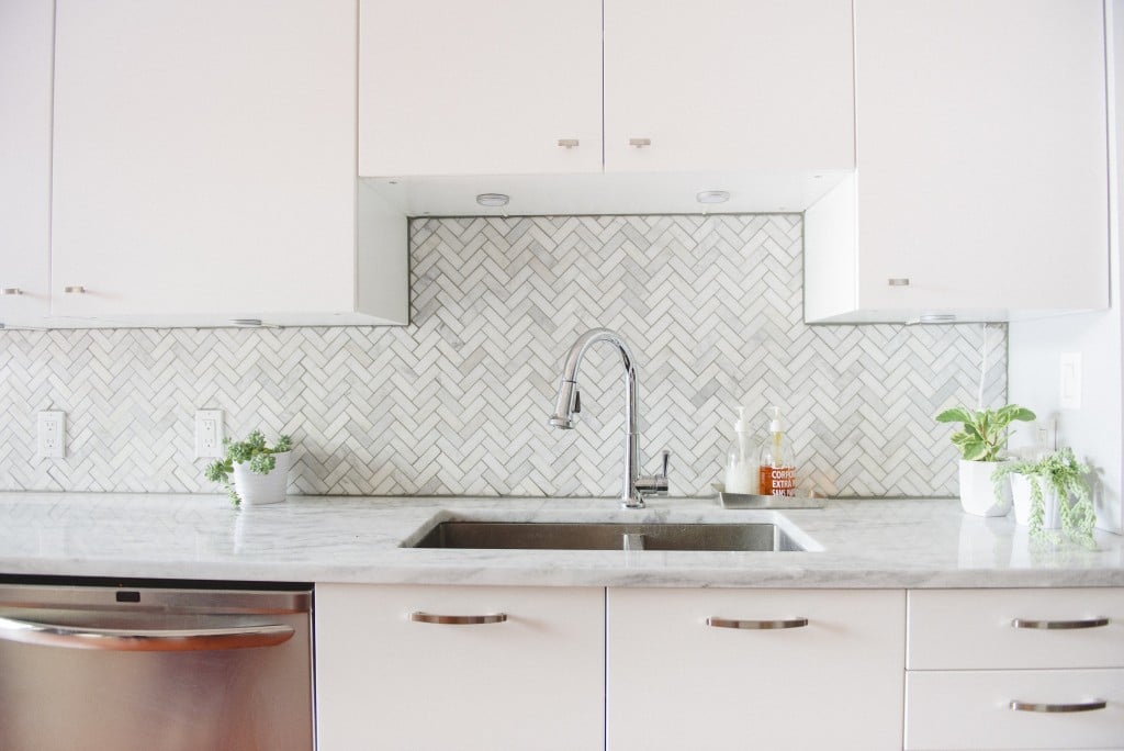 Marble Herringbone Backsplash in white kitchen - At-Home entertaining and house party decor styled shoot with wedding planner Rebecca Chan www.rebeccachan.ca