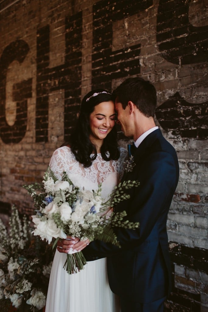 Intimate Burroughes Building wedding with string lights and lavender