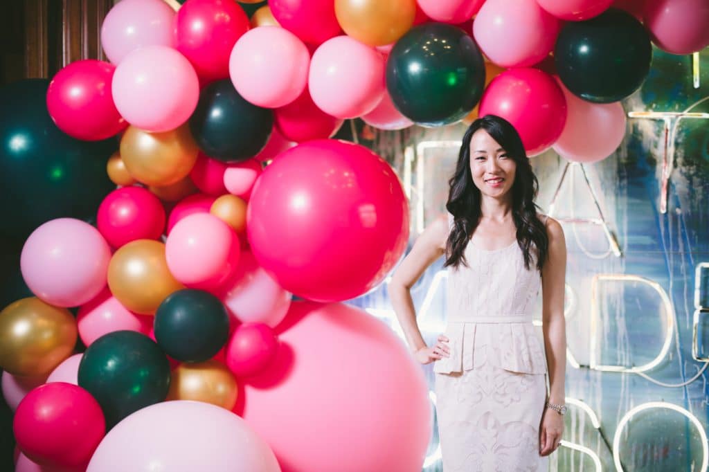 Private party for Rupi Kaur - jewel toned balloon spill