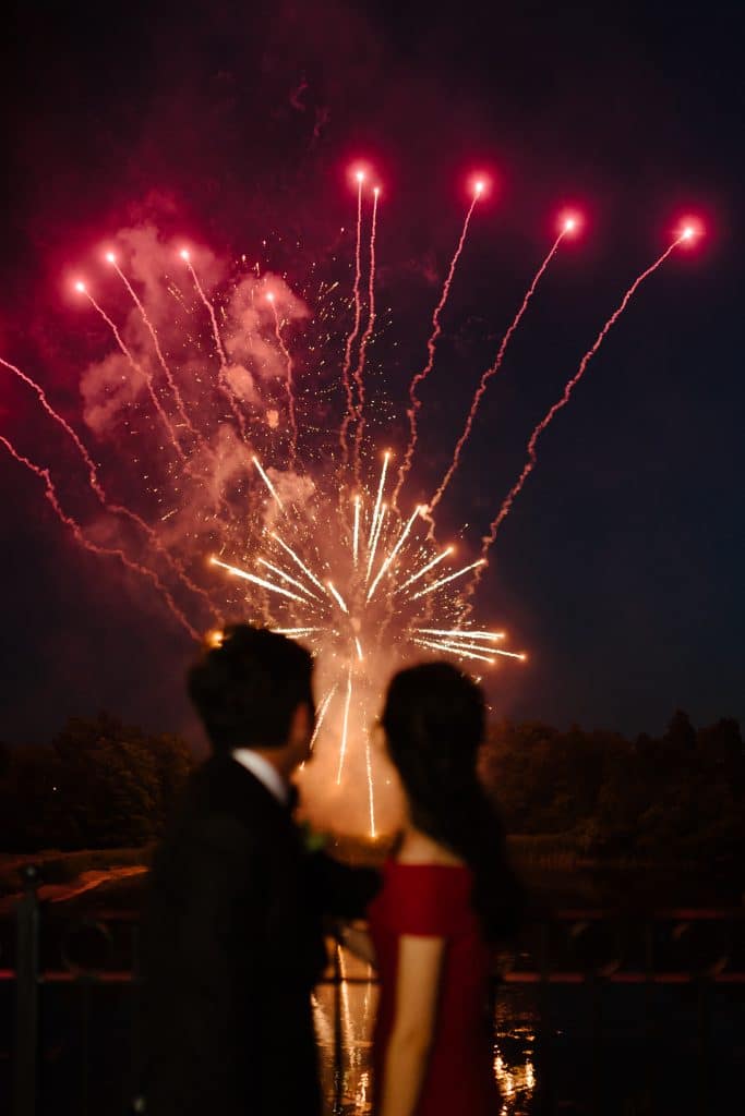 Fireworks at a luxurious blush garden wedding at Eagles Nest Golf Course