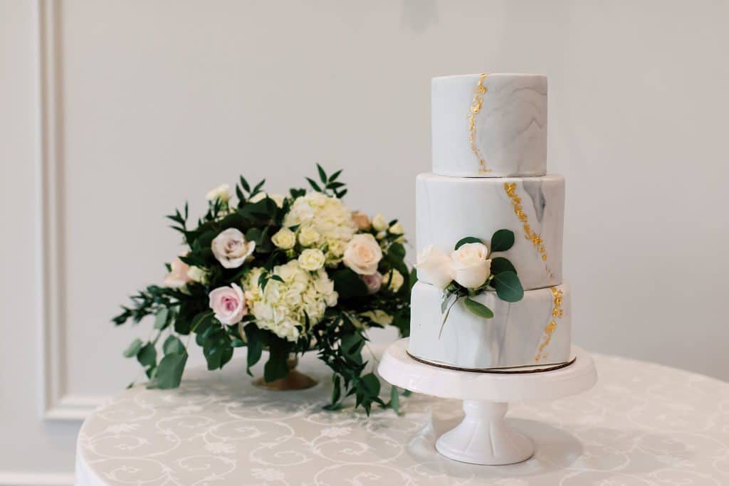 Modern garden wedding with gold and marble