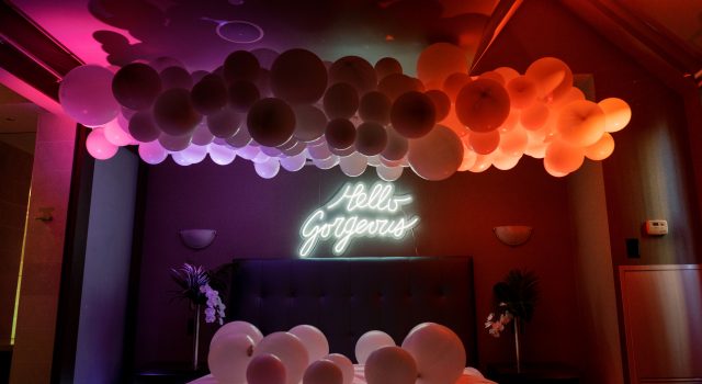 Electric Bedroom photobooth with balloons and LED lighting at One King West Hotel's Summer Social