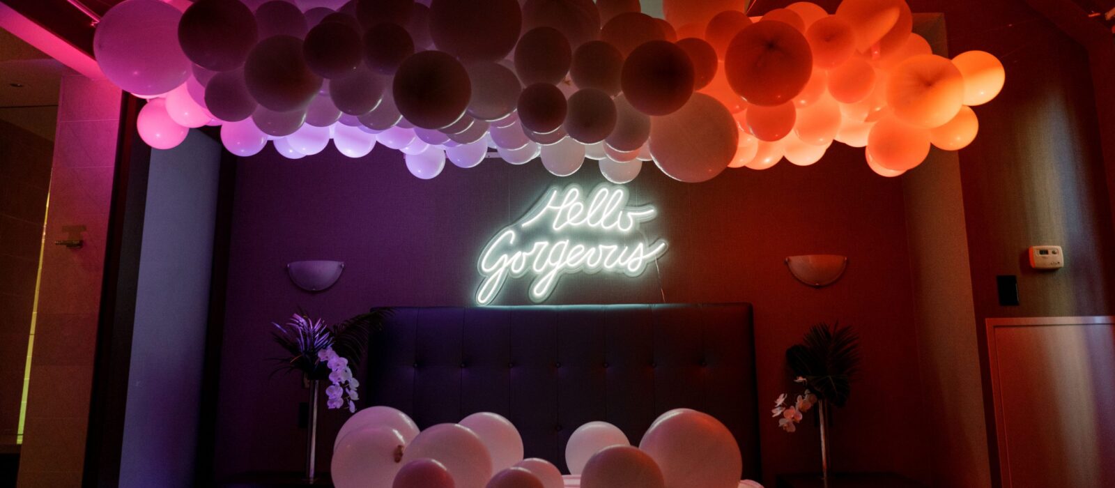 Electric Bedroom photobooth with balloons and LED lighting at One King West Hotel's Summer Social