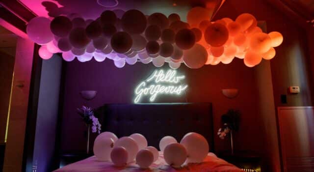 Electric Bedroom photobooth with balloons and LED lighting at One King West Hotel's Summer Social