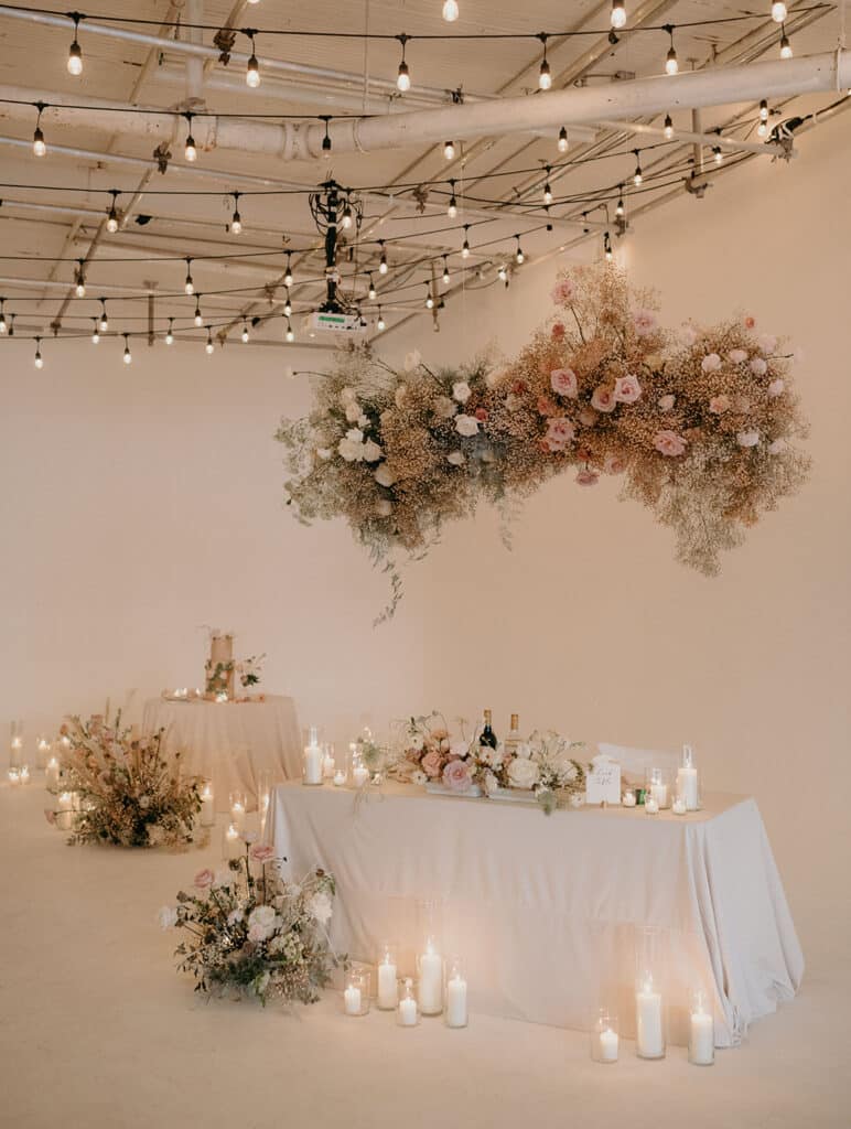 Dreamy baby's breath and hanging floral head table 
