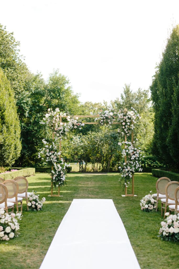 Wedding ceremony in garden - Classic and timeless Graydon Hall Manor Garden wedding. Planning by Rebecca Chan Weddings and Events.