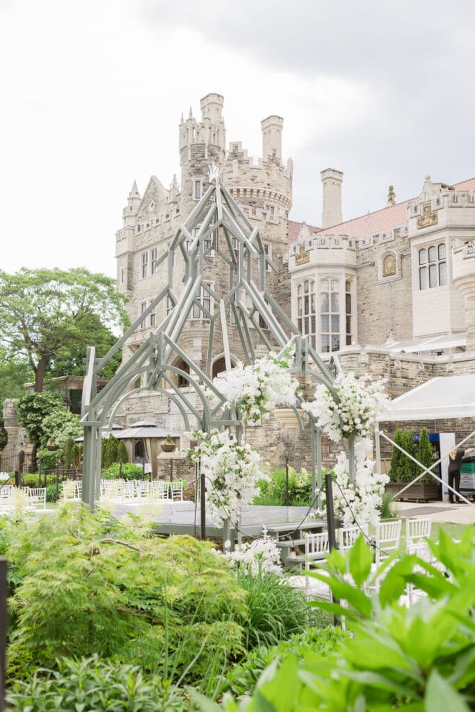 Classic Casa Loma Wedding Ceremony with white roses. Planned by Rebecca Chan Weddings & Events