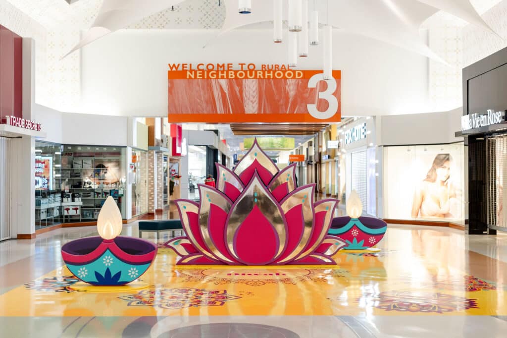 Toronto mall activation celebrating Diwali - A beautiful lotus design with 3D diya candles and vibrant rangoli pattern floor vinyl